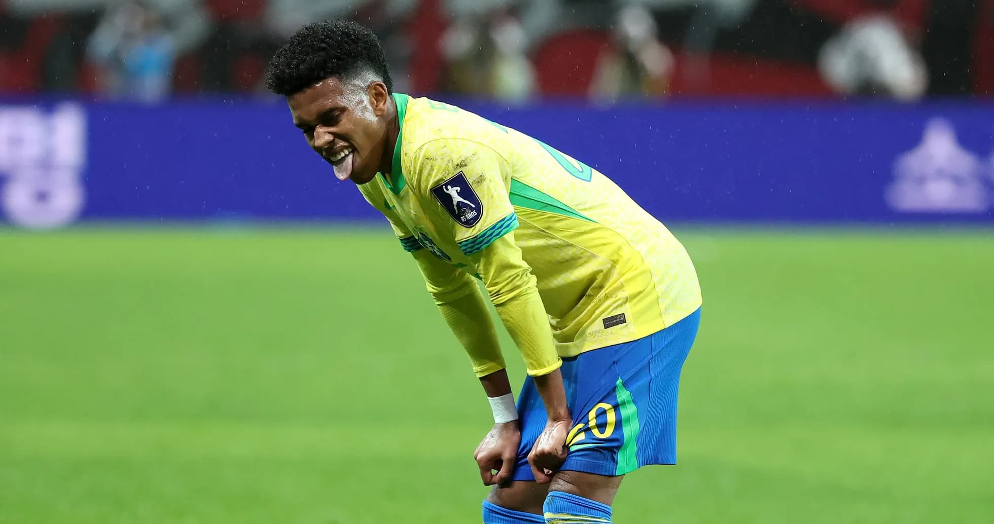 Brazilian player reacting during a match on field