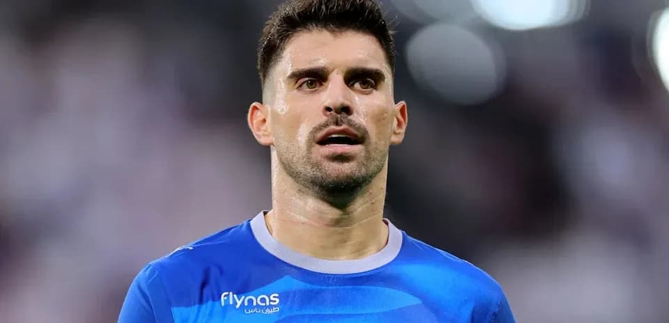 Player wearing blue jersey during match