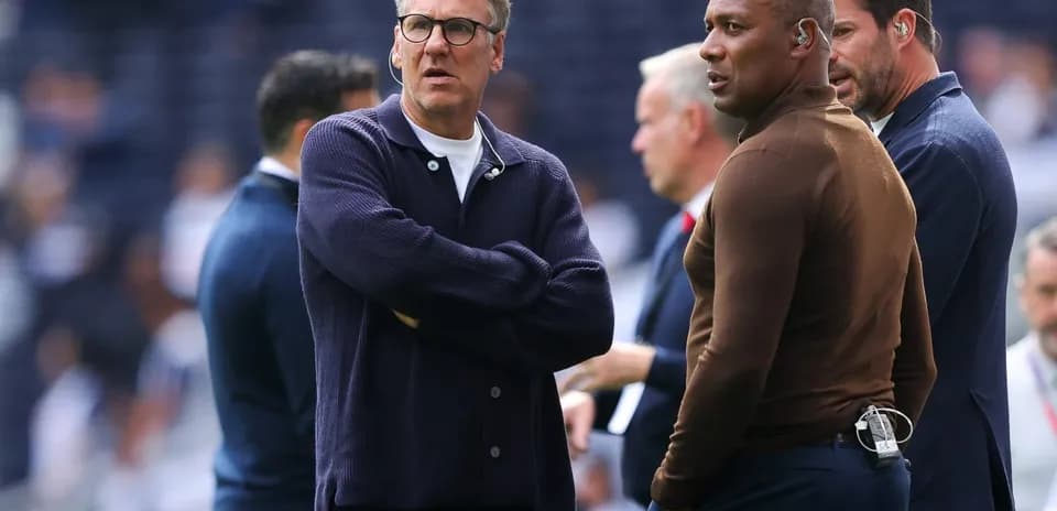 Coaches discussing before the match in stadium