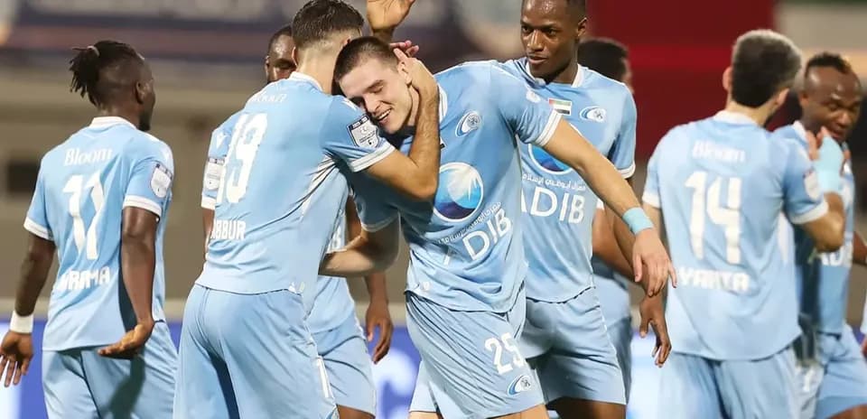 Players celebrating a goal during U23 football match