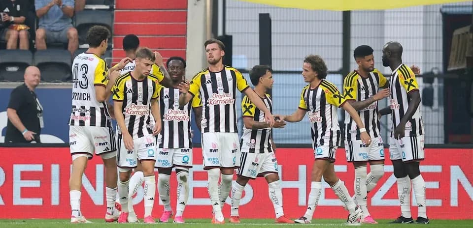 Players celebrating together on the field