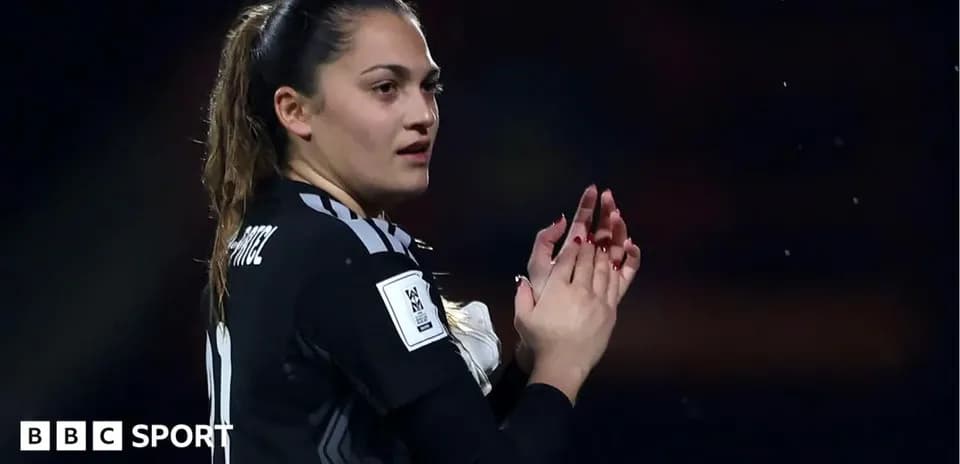 Goalkeeper applauding fans after match