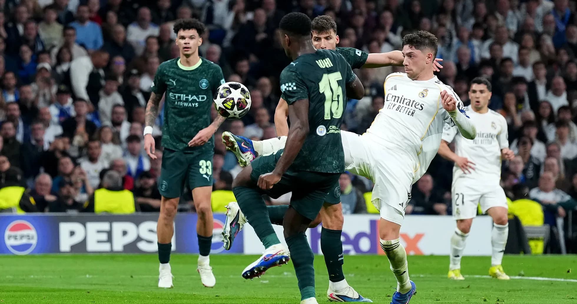 Players battling for the ball in UEFA match