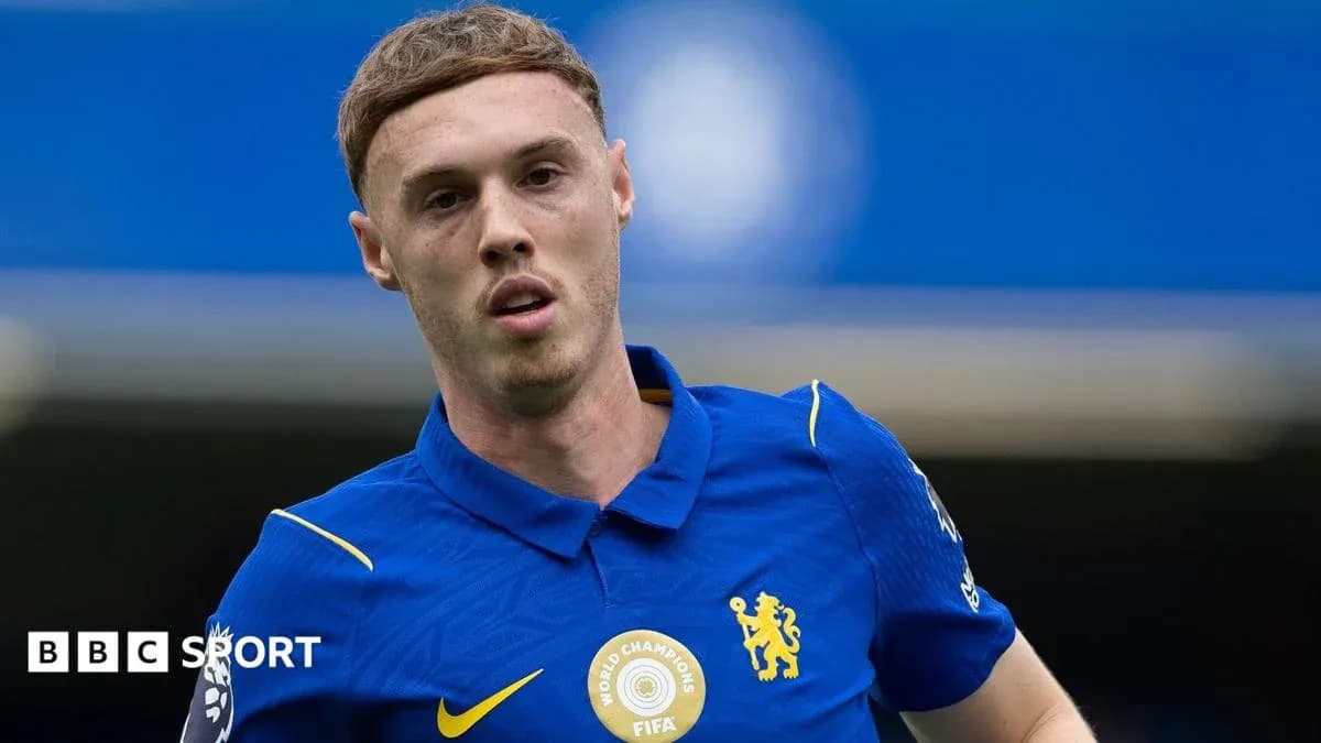 Player in blue Chelsea kit during match action