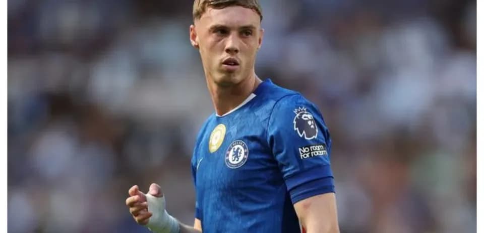 Player in blue Chelsea kit during match