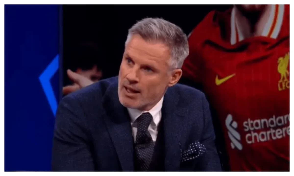 Analyst discussing football on set with Liverpool background