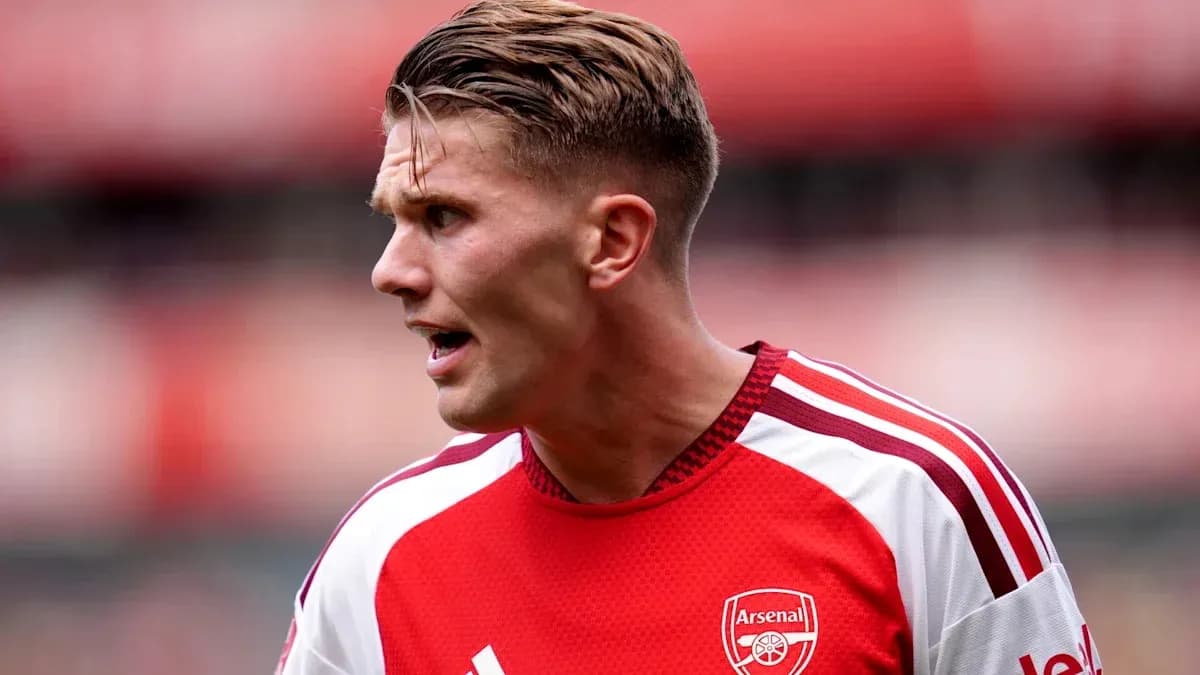 Player wearing Arsenal jersey during match