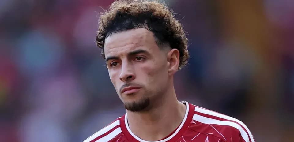 Football player in red jersey looking focused