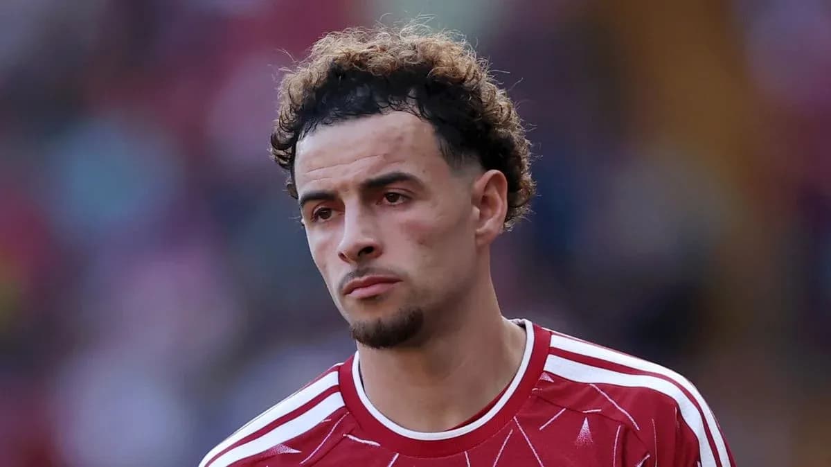 Football player in red jersey looking focused
