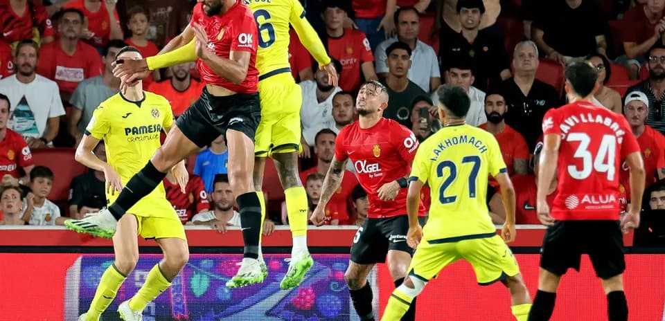 Mallorca player heads the ball against Villarreal