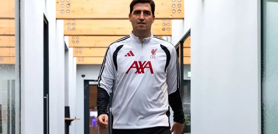 Liverpool FC staff member walking in corridor