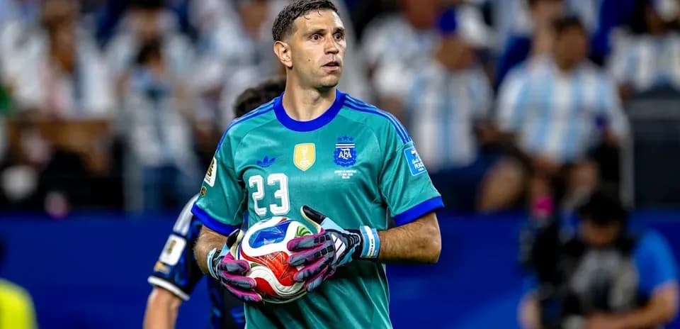 Goalkeeper holding the ball during match