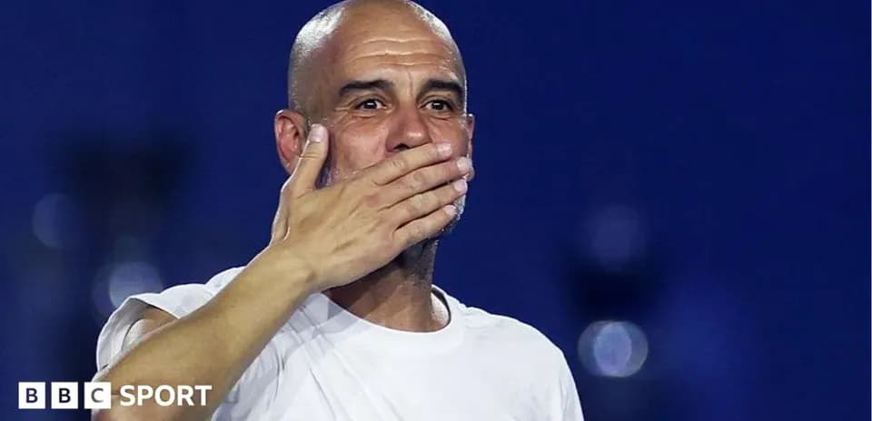 Manager gesturing during a post-match celebration