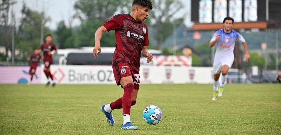 Player dribbling the ball during match