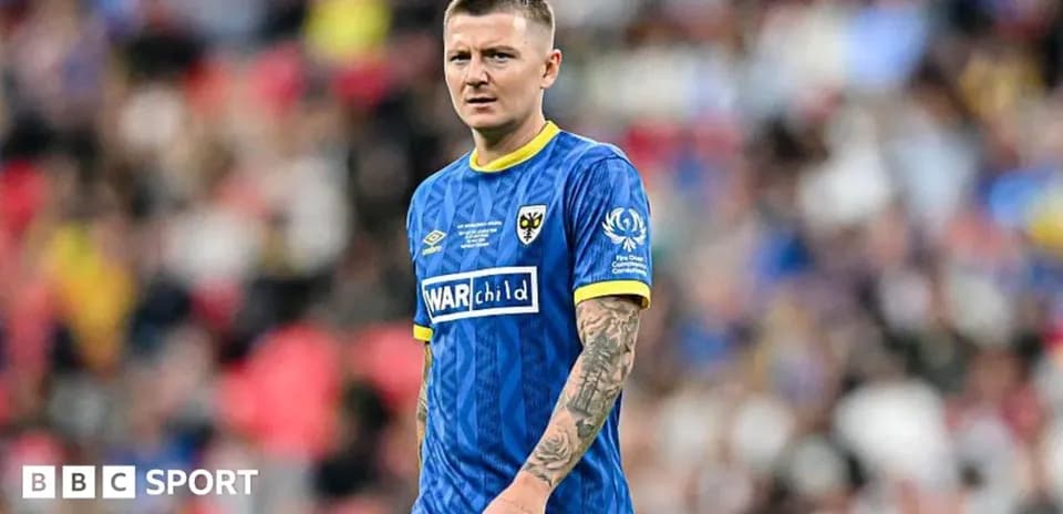Player in blue kit during a match