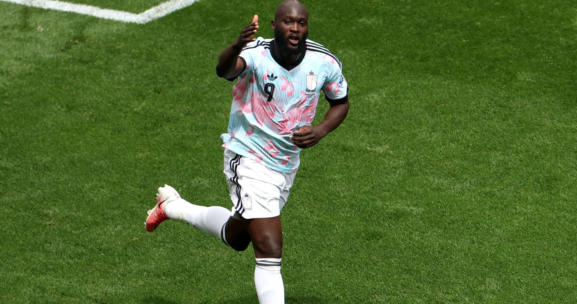 Player celebrating after scoring a goal on field