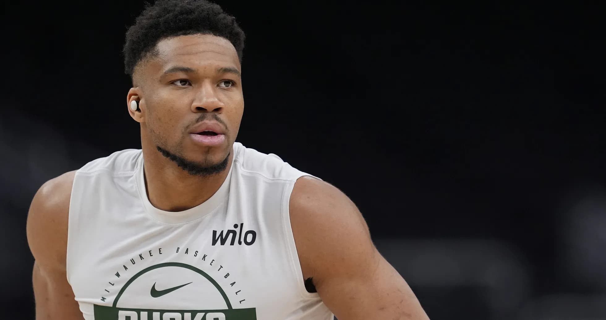 Player warming up in Milwaukee Bucks practice gear