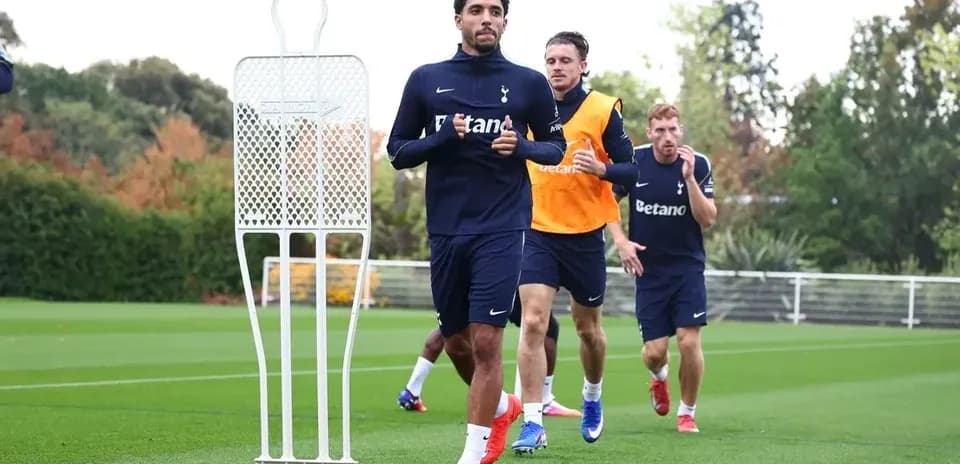 Tottenham players training on the pitch during session