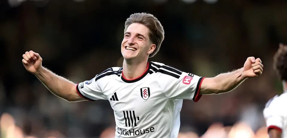 Fulham player celebrating a goal during match