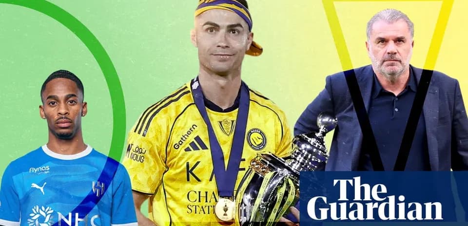 Three football figures posing with a trophy