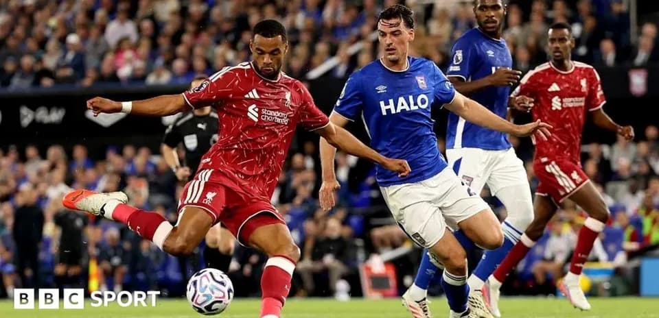 Liverpool player kicking ball against Ipswich Town