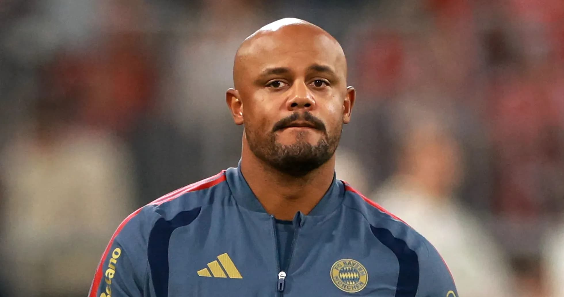 Player in Bayern Munich training kit looking serious