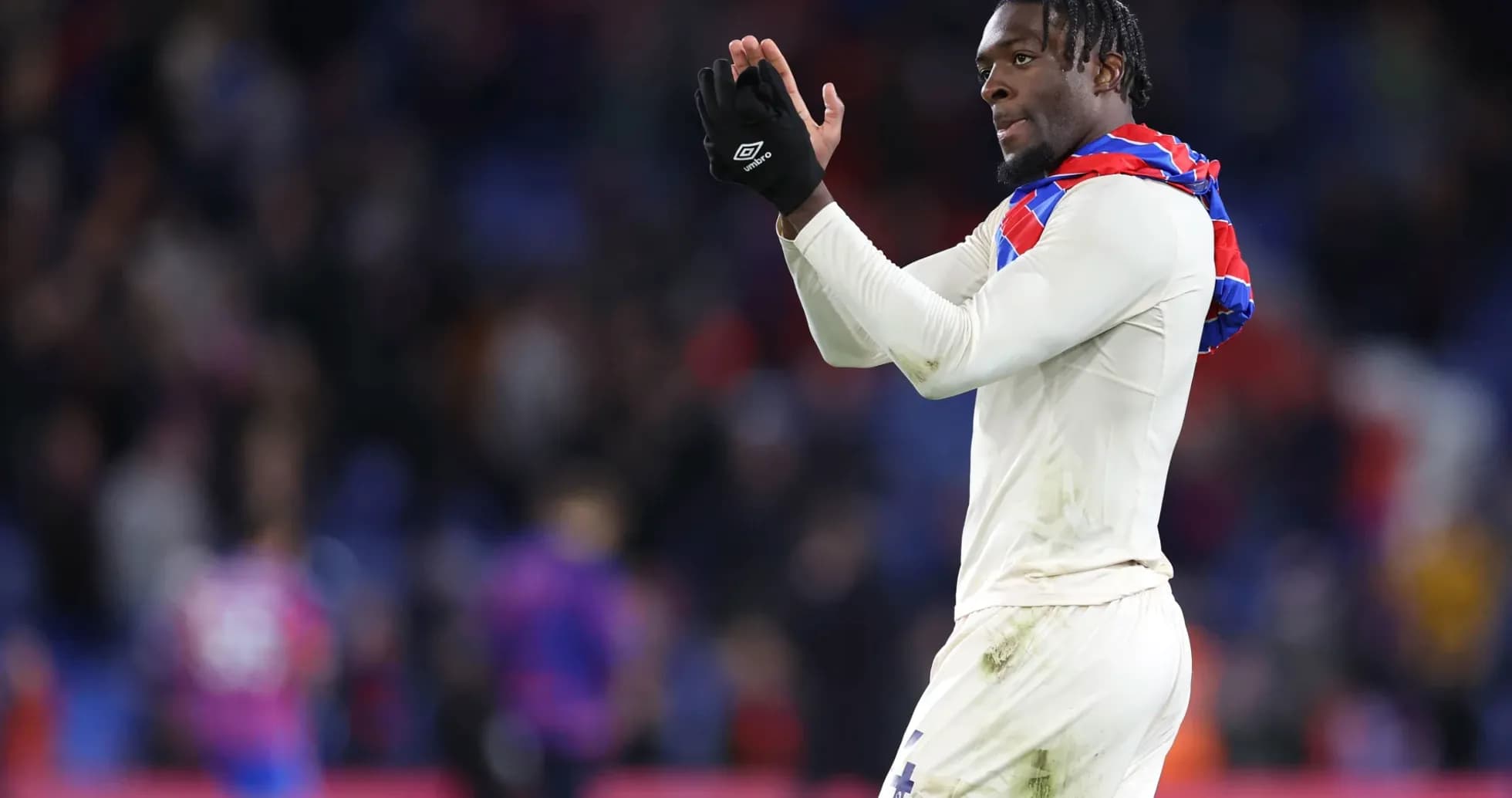 Player applauding fans after the match