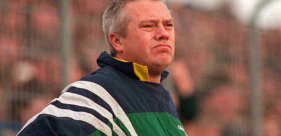 Coach observing the match from the sidelines
