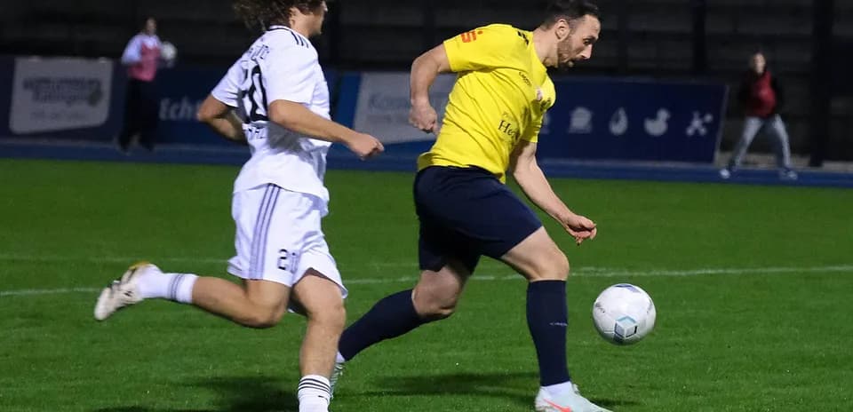 Player dribbling the ball during Oberliga match