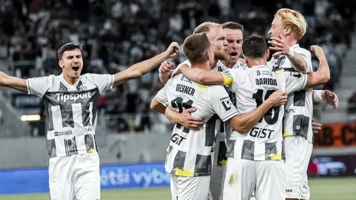 Players celebrating a goal during UEFA match