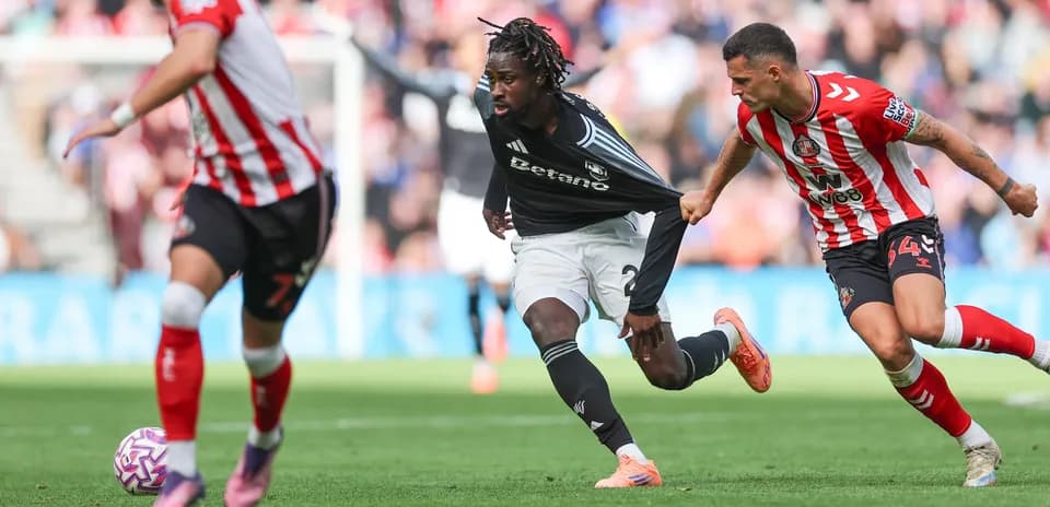 Aston Villa player sprinting during match against Sunderland
