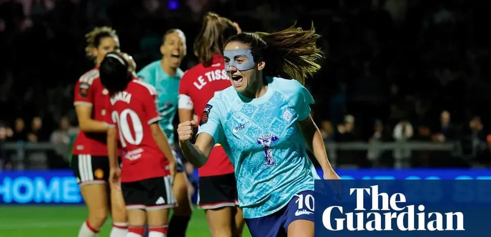 Player celebrating a goal during women's football match