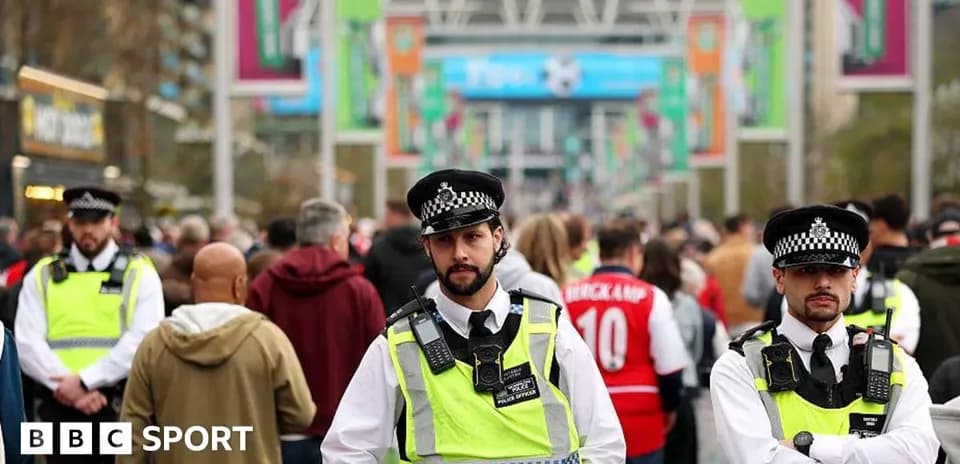 Police officers overseeing crowd outside Wembley Stadium