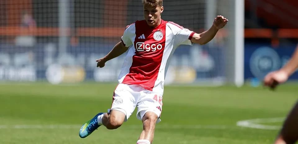 Player kicking ball during a soccer match