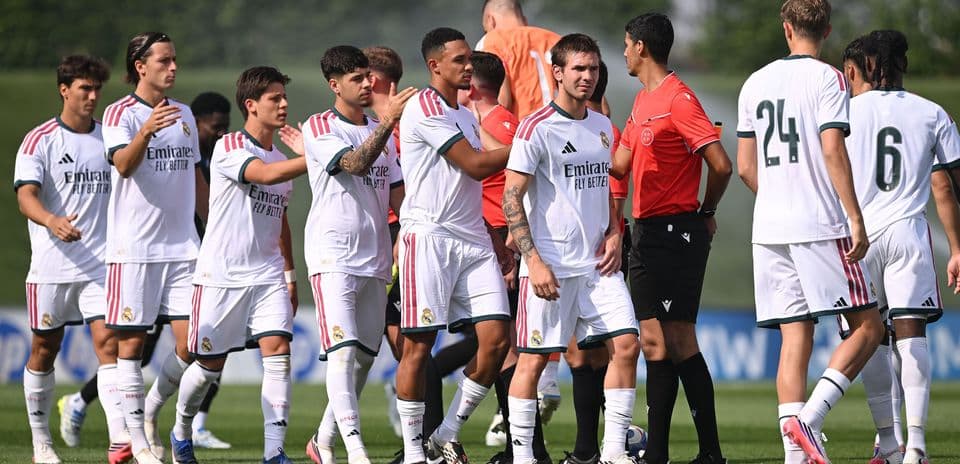 Real Madrid players greeting officials before training