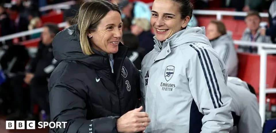 Coaches from Chelsea and Arsenal chatting on the sidelines