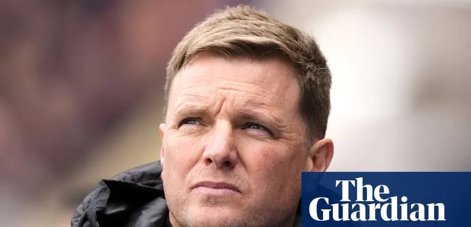 Football manager looking thoughtfully during match