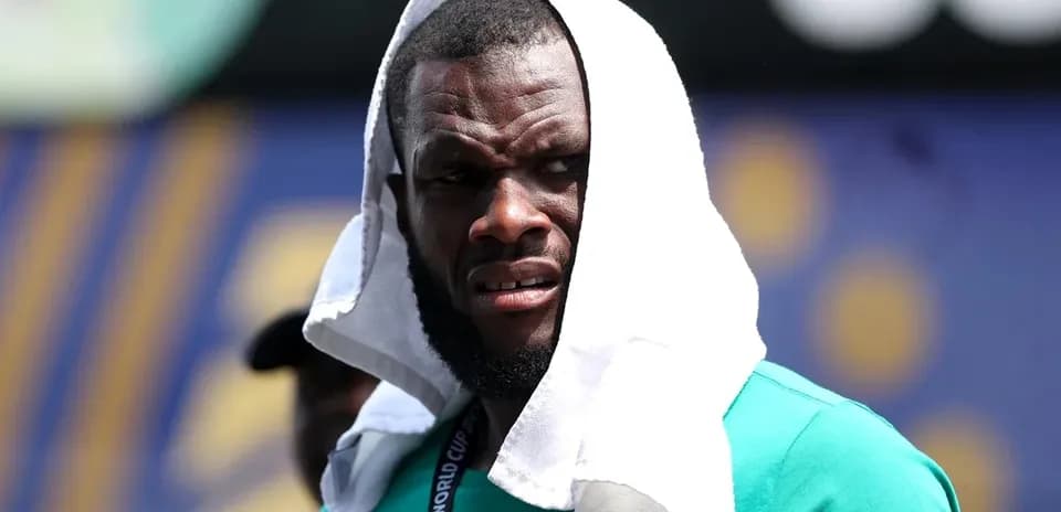 Player wearing a towel during training session