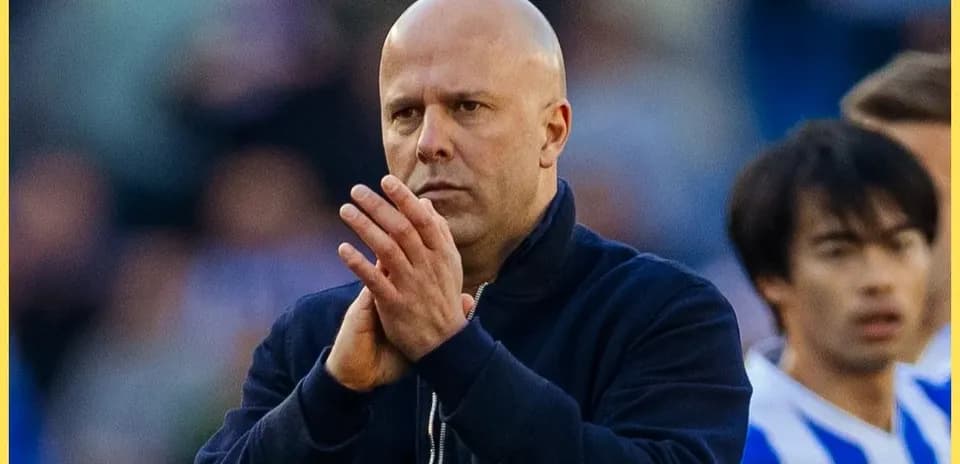 Coach clapping on the sidelines during a match