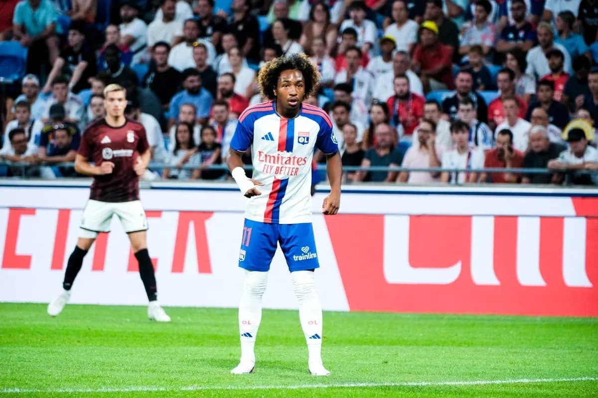 Player in Lyon kit during a match on field