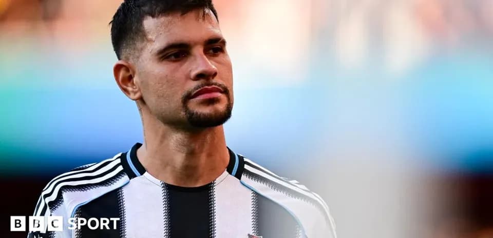 Newcastle player looking on during match
