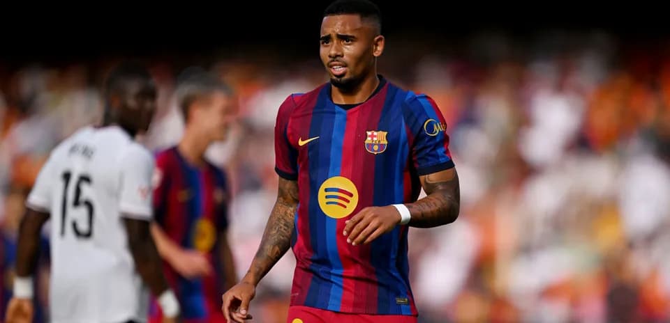 Player wearing Barcelona jersey during match action