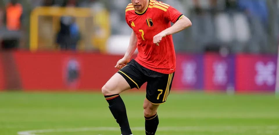 Belgium player dribbling during football match