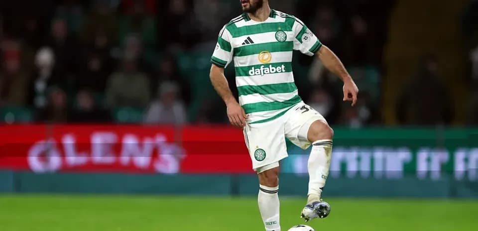 Celtic player controlling ball on pitch