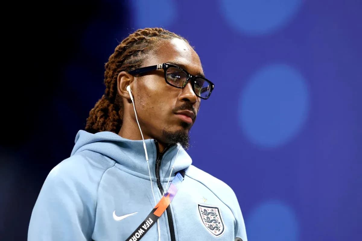 Player wearing glasses and headphones before match