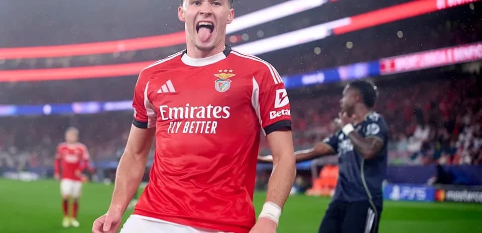 Benfica player celebrating after scoring a goal