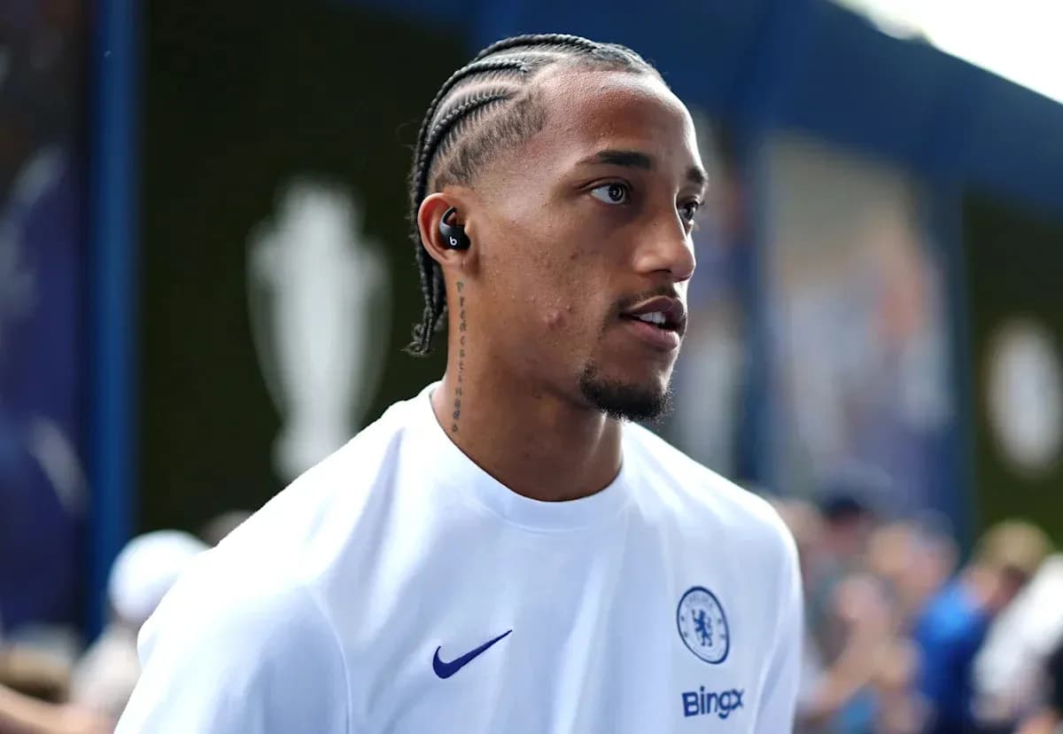 Player wearing Chelsea kit entering the stadium