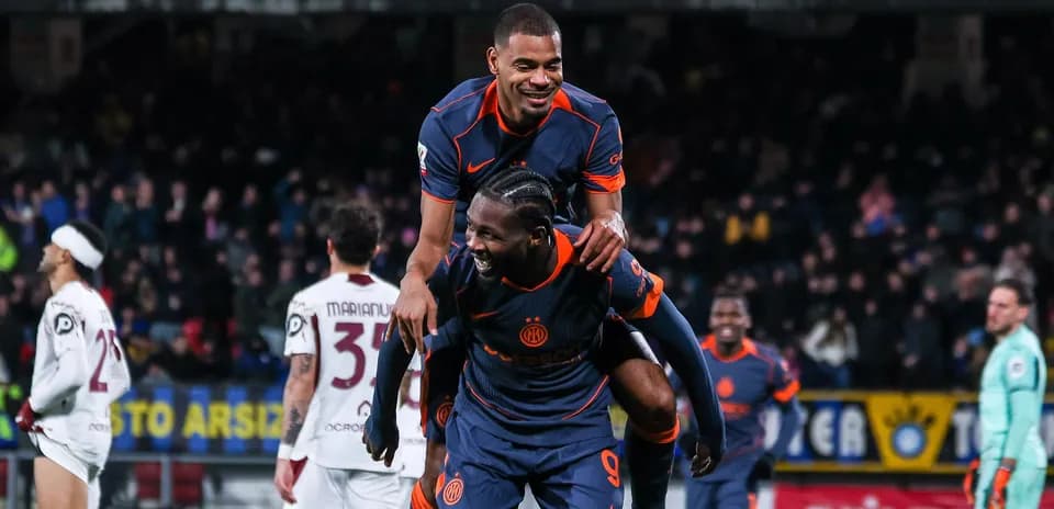 Players celebrating a goal during a match