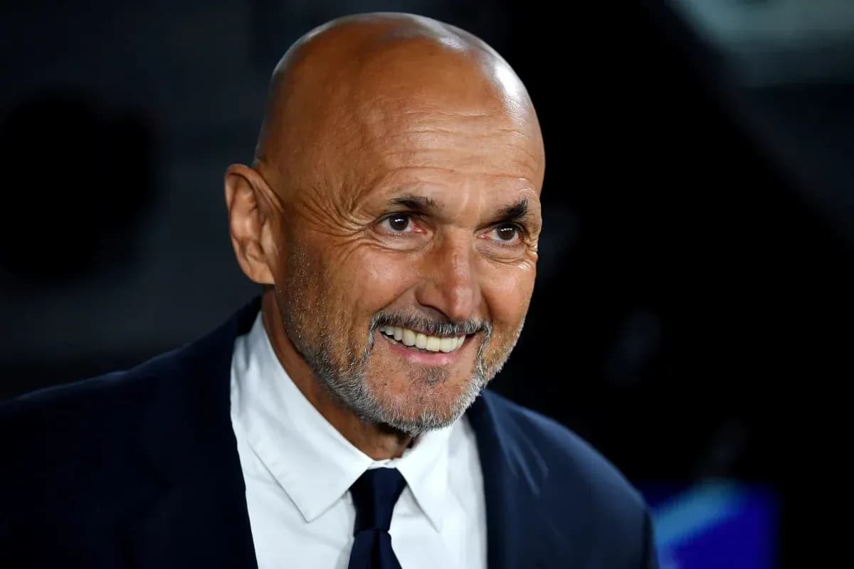 Smiling coach in a suit at event