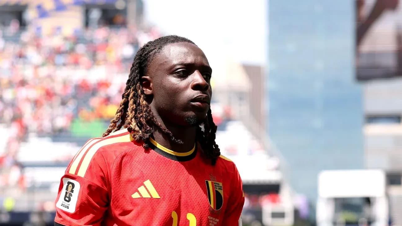 Belgian player in red jersey during match warm-up